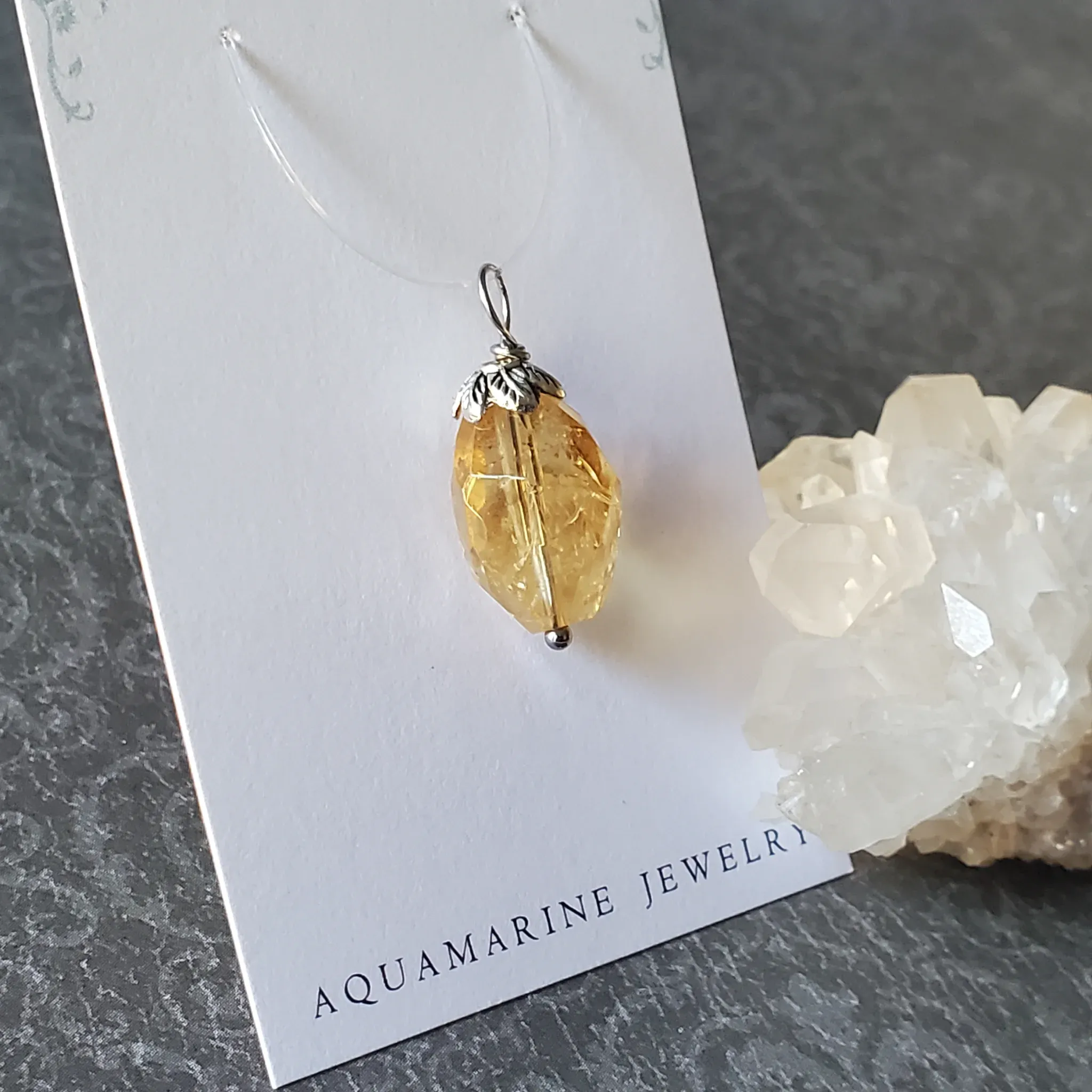 27mm x 11mm x 11mm Citrine Pendant (photo 3 of 12)
