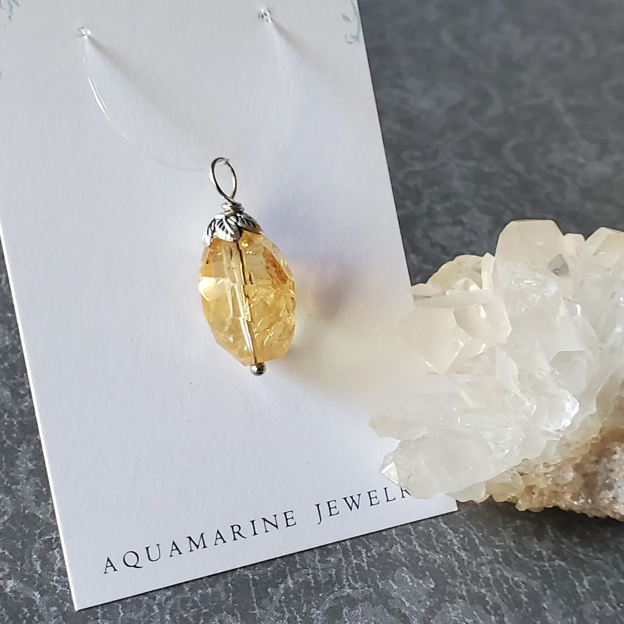 27mm x 11mm x 11mm Citrine Pendant (photo 4 of 12)