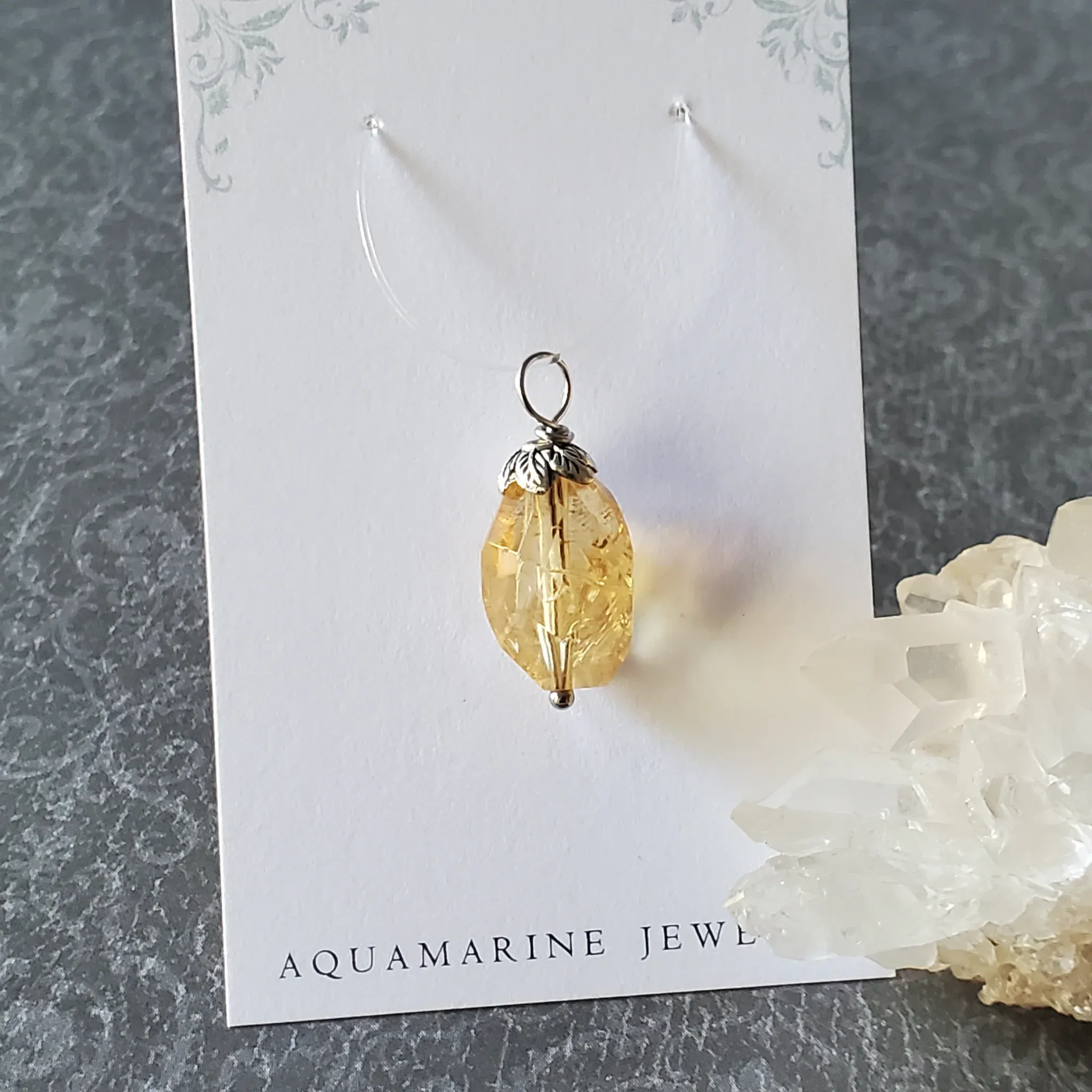 27mm x 11mm x 11mm Citrine Pendant (photo 6 of 12)