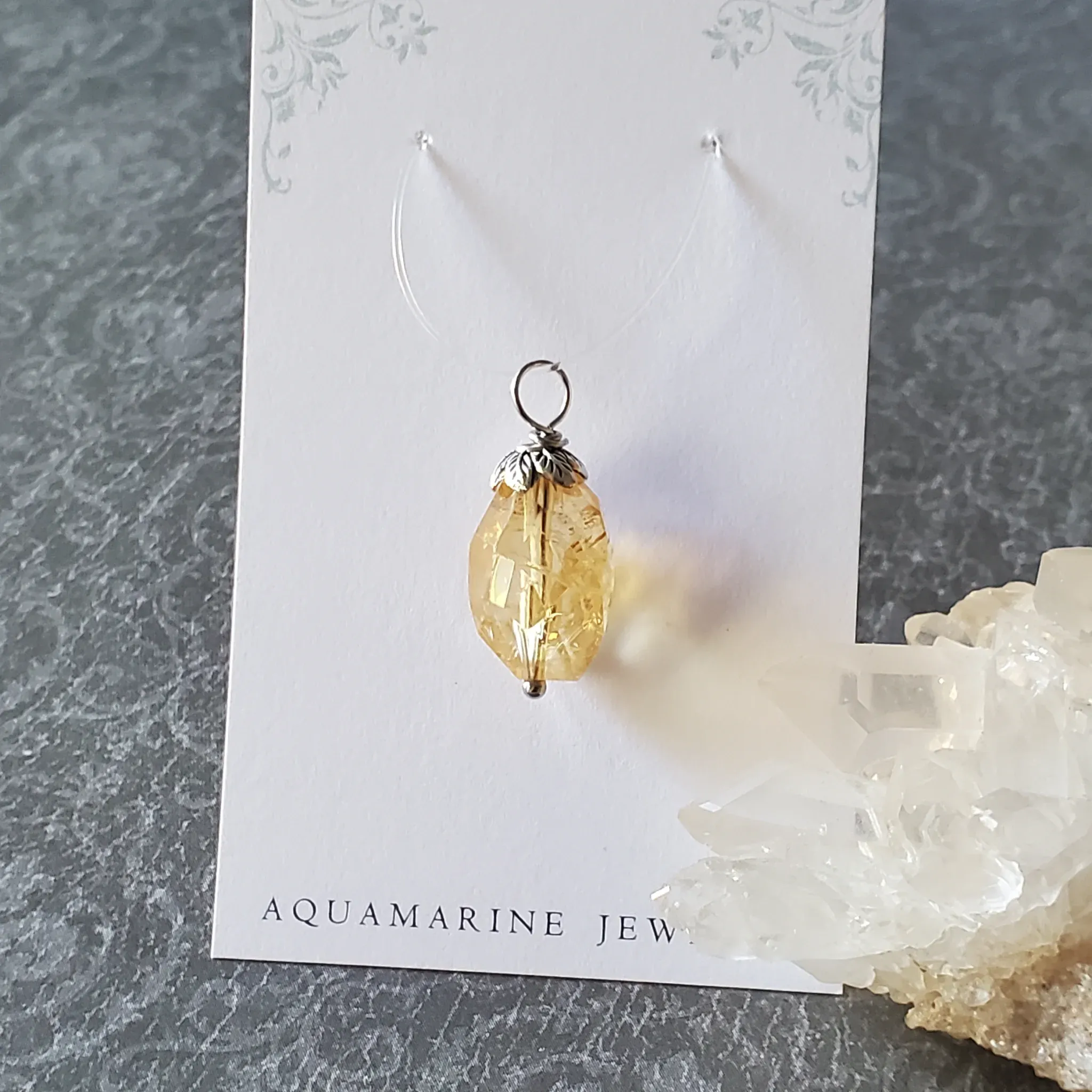 27mm x 11mm x 11mm Citrine Pendant (photo 7 of 12)